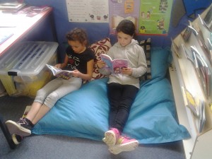 These two girl cannot get enough of reading!
